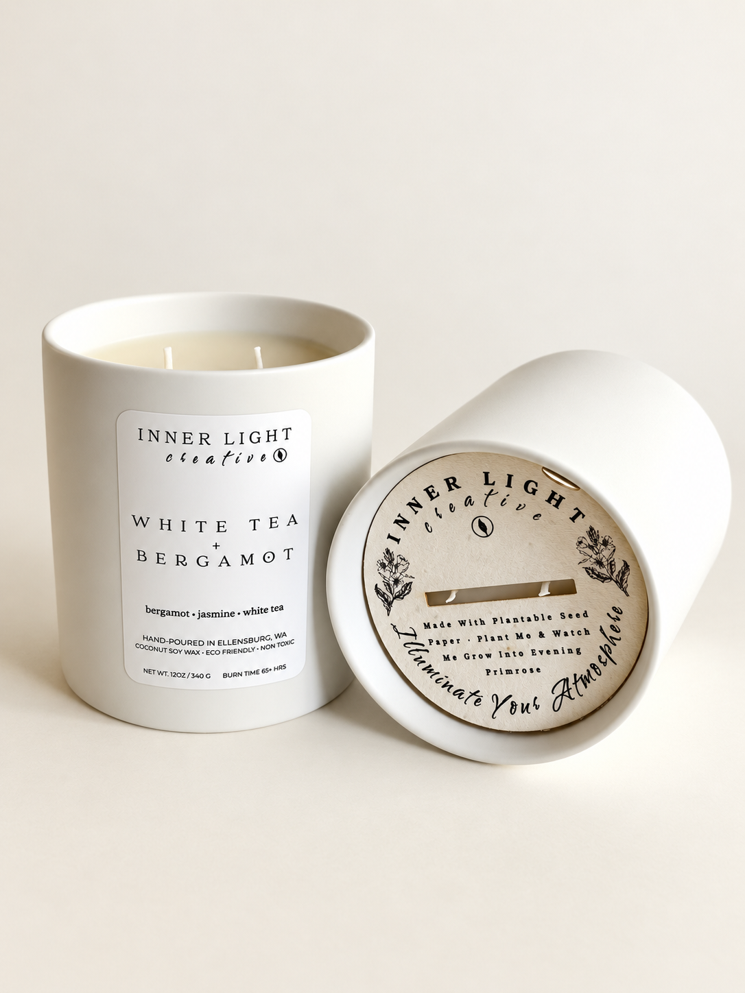 White Tea + Bergamot candle with plantable seed-paper topper in a reusable white ceramic vessel