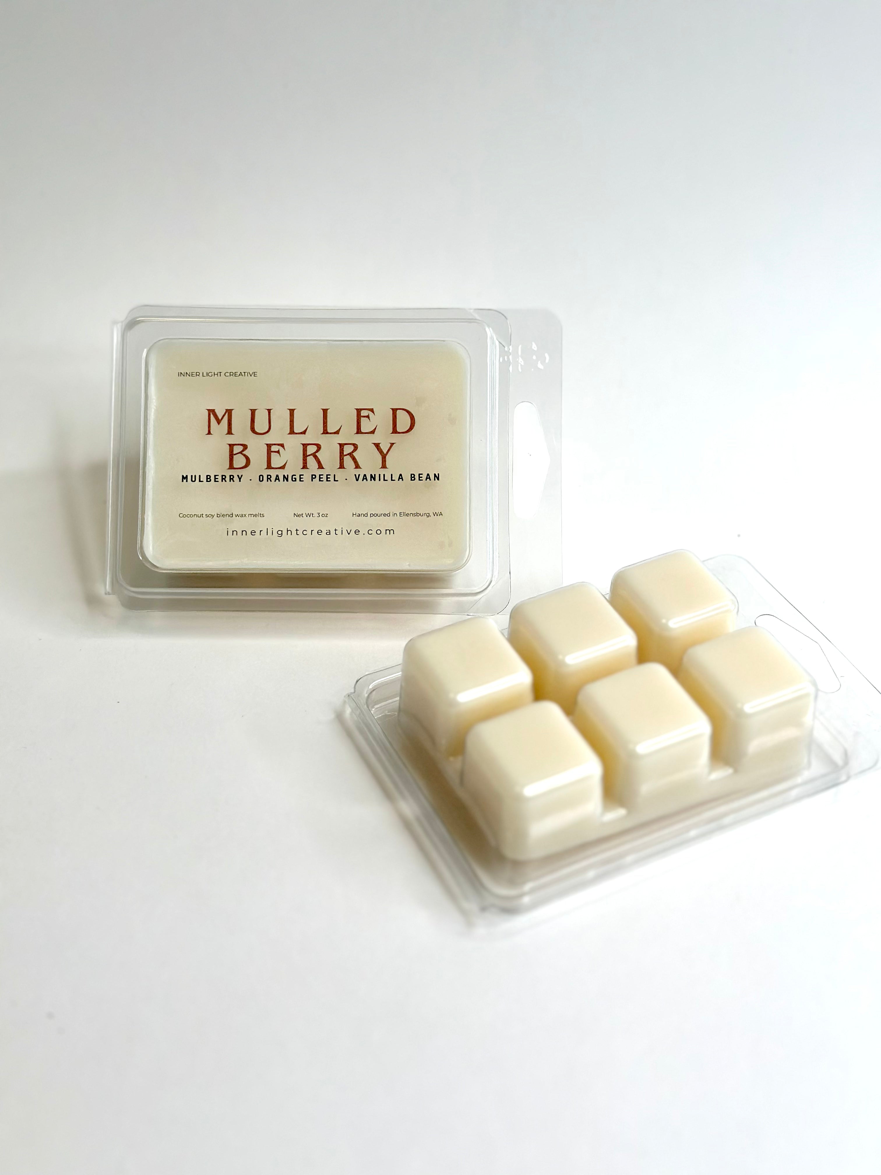 Packaged wax melts with 'Mulled Berry' label on a white background