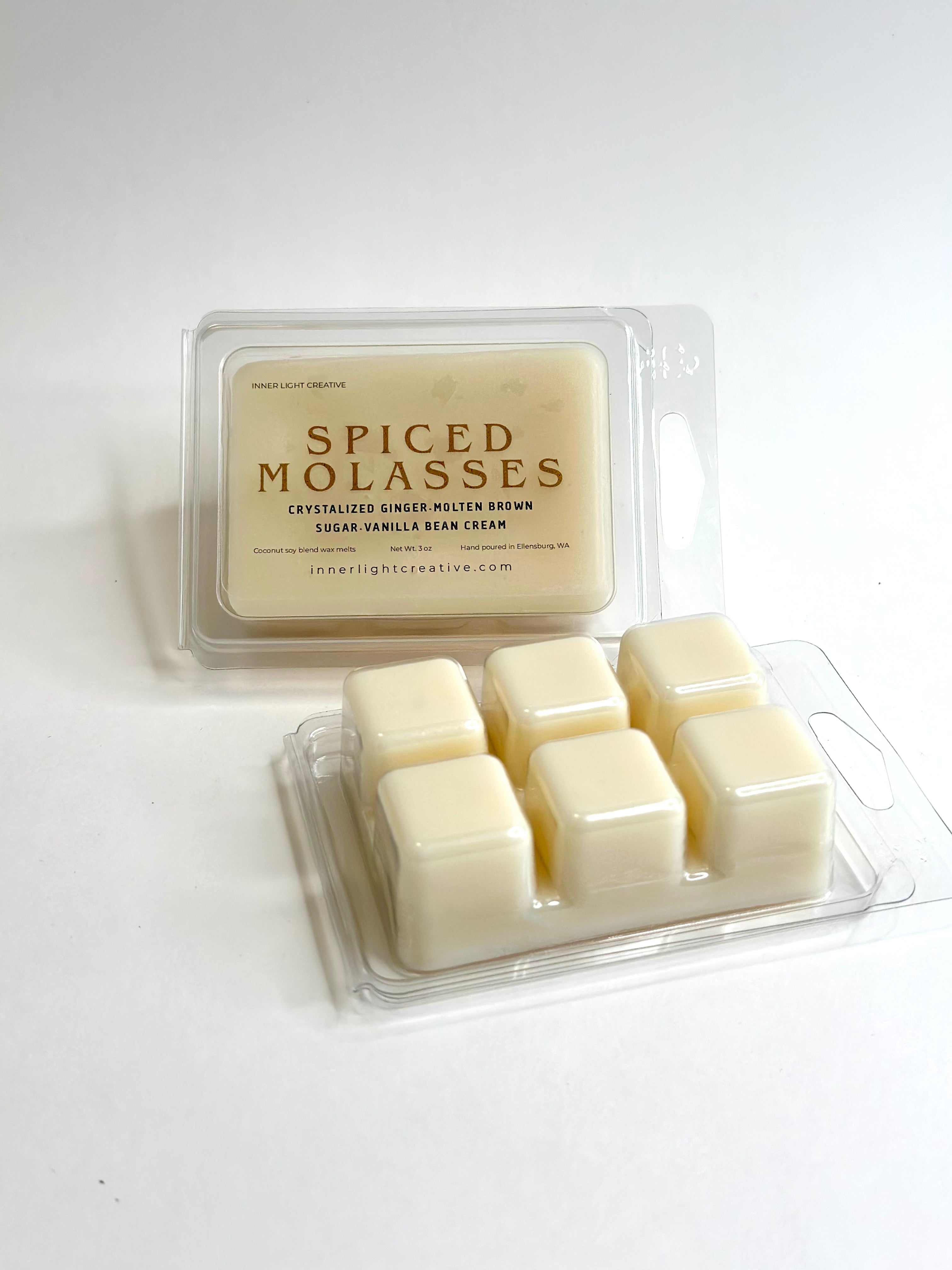 Packaged spiced molasses wax melts on a white background